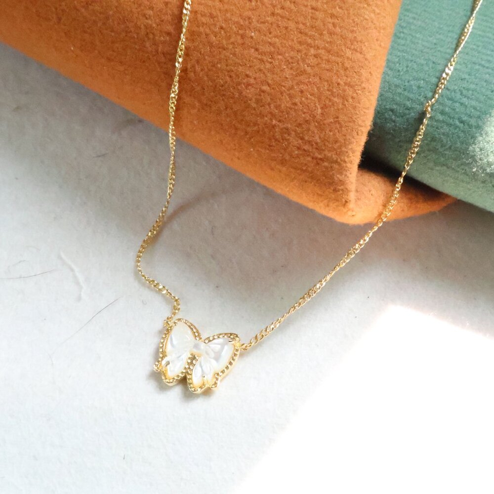 Kendra Scott Gold Haley Bow Ivory Mother-of-Pearl Necklace - Picture 2 of 2